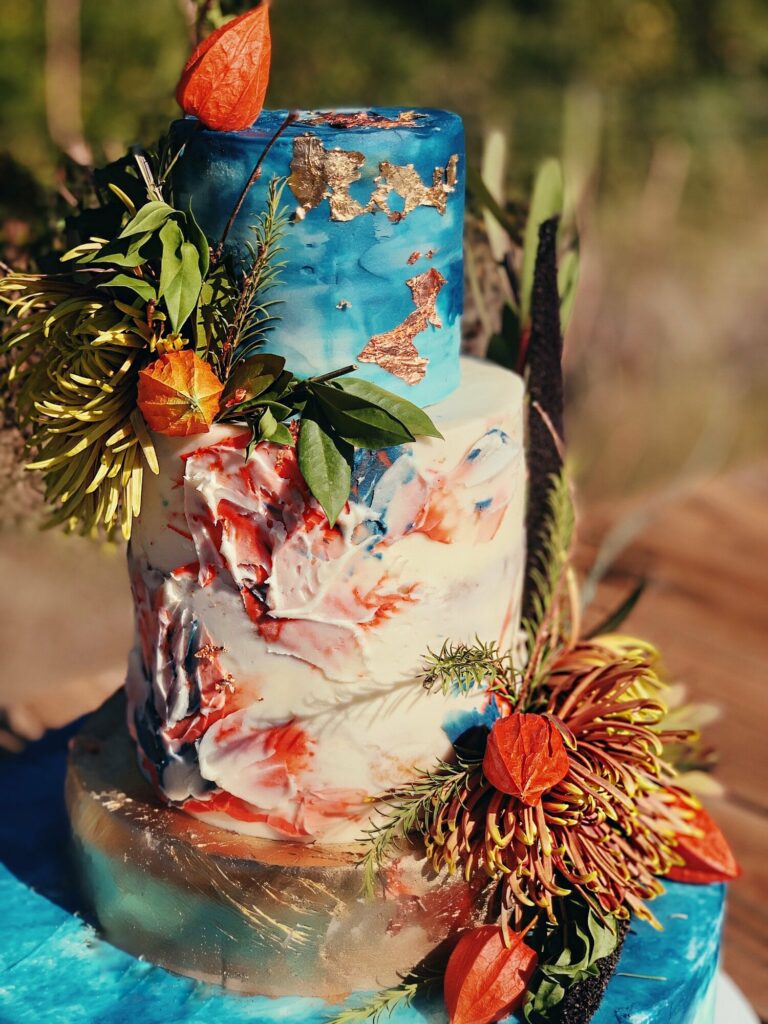 All American Bark-Inspired Wedding Cake with Antler Cake Topper and Sugar  Cherry Blossoms | Wedding Inspiration Board | Junebug Weddings