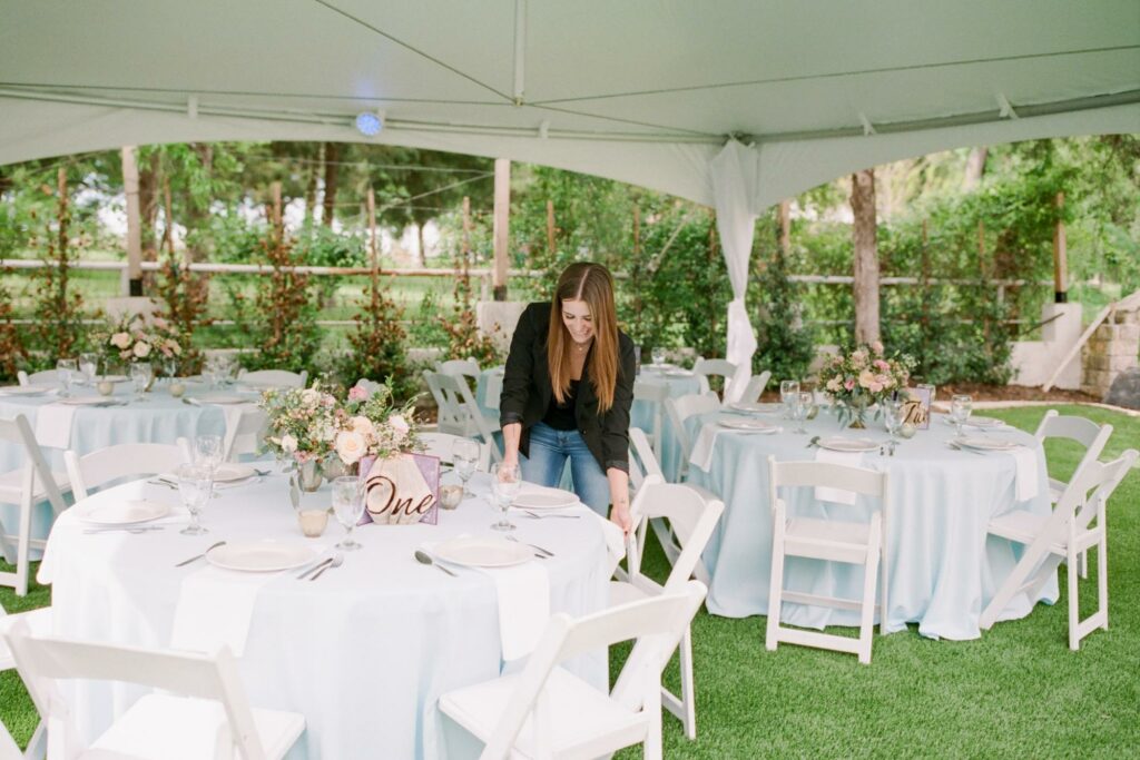 White chairs with pink flowers