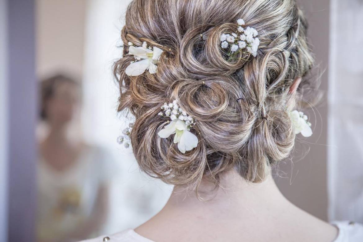 Floral wedding bun hairstyle