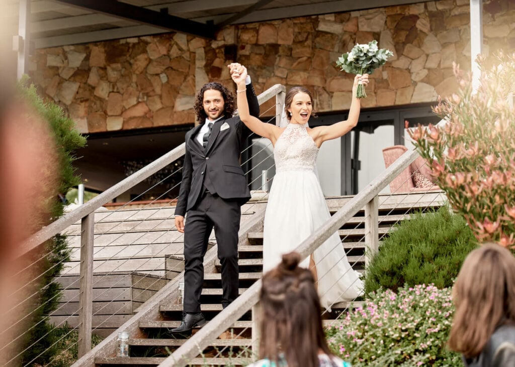 The bride and groom prepare to leave after their wedding reception is over